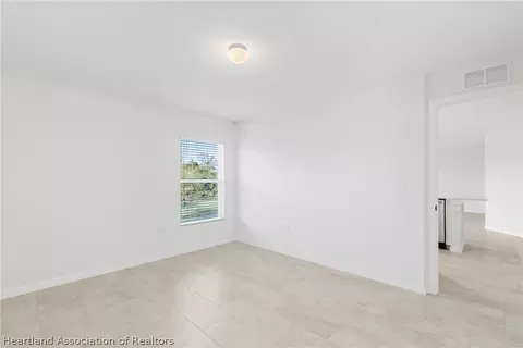 Bedroom - 6151 Monegro St, Sebring, FL 33872 photo 2 of 7