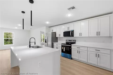 Kitchen - 6348 Virtudes St, Sebring, FL 33872 photo 3 of 4