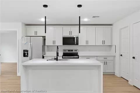Kitchen - 6348 Virtudes St, Sebring, FL 33872 photo 2 of 4