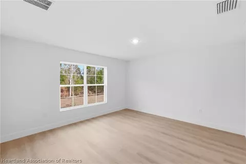 Bedroom - 6348 Virtudes St, Sebring, FL 33872 photo 7 of 8