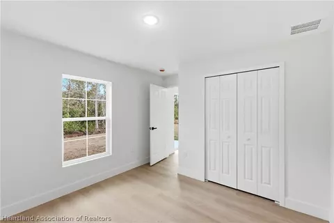 Bedroom - 6348 Virtudes St, Sebring, FL 33872 photo 6 of 8