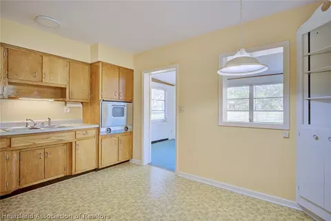 Kitchen - 1110 Taseschee Dr, Sebring, FL 33870 photo 4 of 4