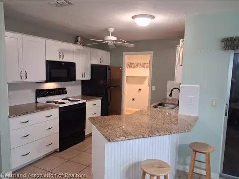 Kitchen - 116 Friendly Cir, Sebring, FL 33876 photo 2 of 3