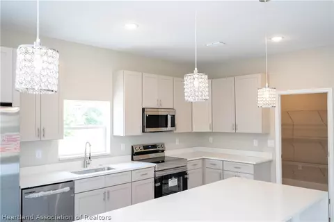 Kitchen - 7916 Granada Rd, Sebring, FL 33876 photo 2 of 9