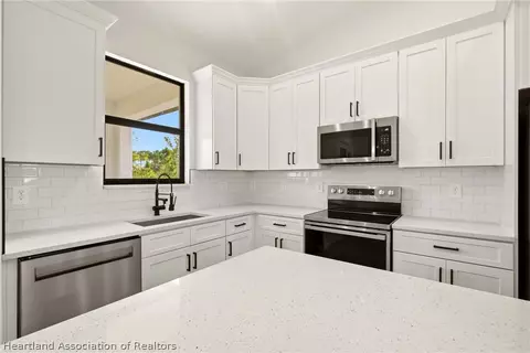 Kitchen - 7322 Granada Blvd, Sebring, FL 33872 photo 3 of 4