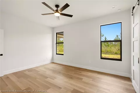 Bedroom - 7322 Granada Blvd, Sebring, FL 33872 photo 8 of 9