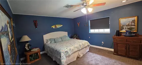 Bedroom - 5800 Us Highway 441 Hwy SE, Okeechobee, FL 34974 photo 2 of 4