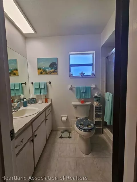 Bath - 7316 Lime Tree Ct, Sebring, FL 33876 photo 4 of 5