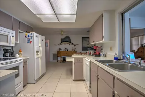 Kitchen - 7316 Lime Tree Ct, Sebring, FL 33876 photo 3 of 3