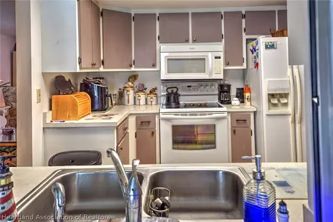 Kitchen - 7316 Lime Tree Ct, Sebring, FL 33876 photo 1 of 3
