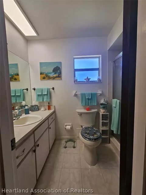 Bath - 7316 Lime Tree Ct, Sebring, FL 33876 photo 4 of 5