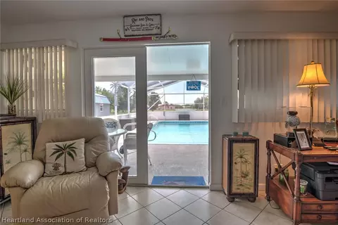 Living - 7316 Lime Tree Ct, Sebring, FL 33876 photo 2 of 4
