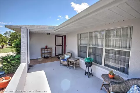 Exterior - 7316 Lime Tree Ct, Sebring, FL 33876 photo 2 of 9
