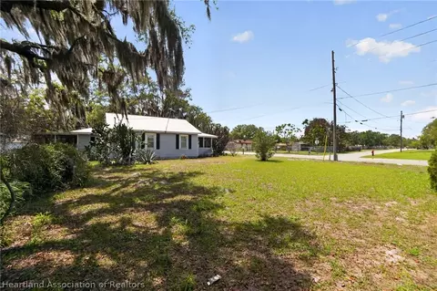 Exterior - 560 N Palm Ave, Frostproof, FL 33843 photo 7 of 14