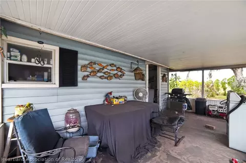 Exterior - 560 N Palm Ave, Frostproof, FL 33843 photo 6 of 14