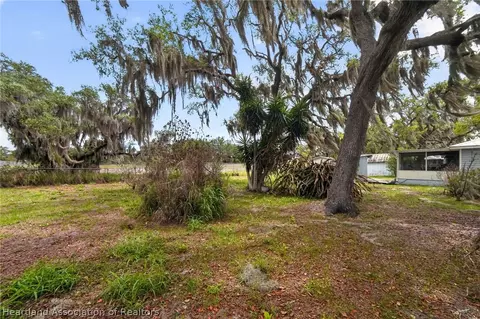 Exterior - 560 N Palm Ave, Frostproof, FL 33843 photo 10 of 14