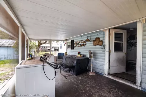 Exterior - 560 N Palm Ave, Frostproof, FL 33843 photo 8 of 14