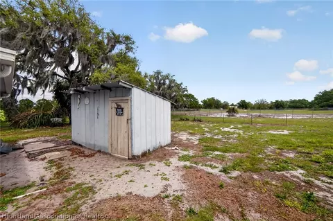 Exterior - 560 N Palm Ave, Frostproof, FL 33843 photo 9 of 14