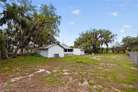 Exterior - 560 N Palm Ave, Frostproof, FL 33843 photo 13 of 14