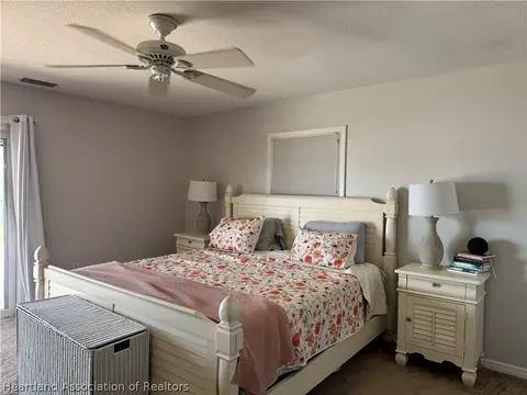 Bedroom - 607 State Road Hwy W, Frostproof, FL 33843 photo 2 of 3