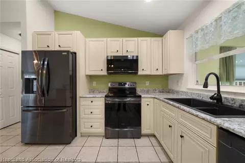 Kitchen - 5445 Angelo Cir, Sebring, FL 33872 photo 1 of 4
