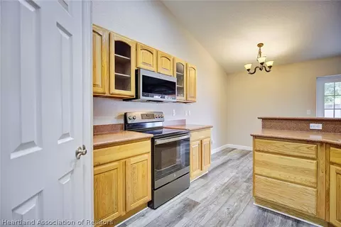 Kitchen - 405 Mac Ln, Sebring, FL 33875 photo 4 of 4