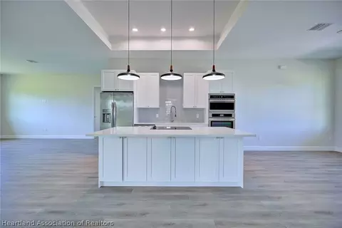 Kitchen - 6416 Concord Dr, Sebring, FL 33876 photo 3 of 7