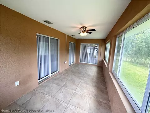 Exterior - 8737 Capilla St, Sebring, FL 33872 photo 6 of 10