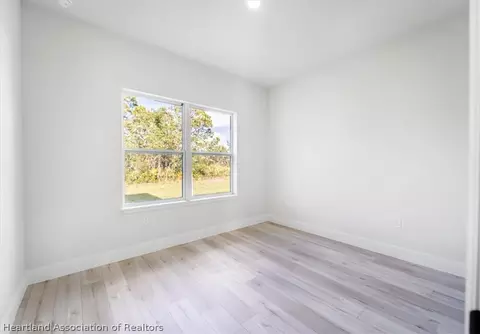 Bedroom - 4895 Myrtle Beach Dr, Sebring, FL 33872 photo 5 of 10
