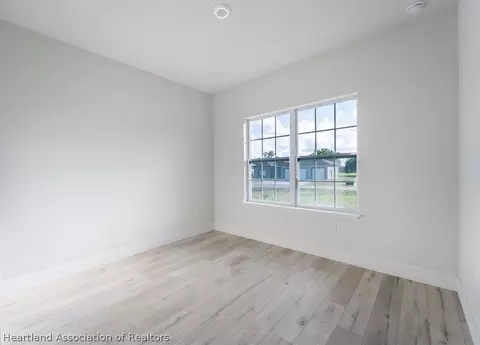 Bedroom - 4895 Myrtle Beach Dr, Sebring, FL 33872 photo 7 of 10