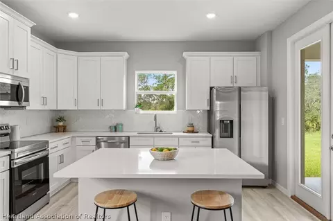 Kitchen - 4329 Cremona Dr, Sebring, FL 33872 photo 2 of 4