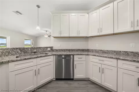 Kitchen - 2104 Flower Ter, Sebring, FL 33875 photo 5 of 6