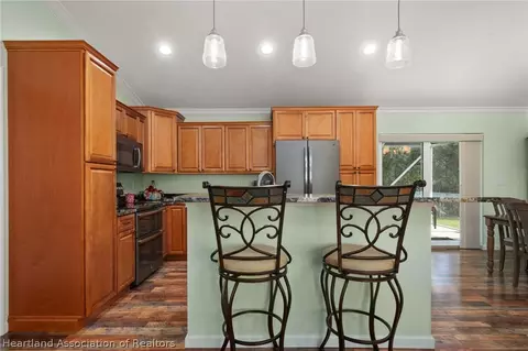 Kitchen - 1440 Kyra Ave, Sebring, FL 33872 photo 2 of 5