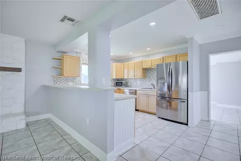 Kitchen - 1216 Edgewater Point Dr, Sebring, FL 33870 photo 1 of 4