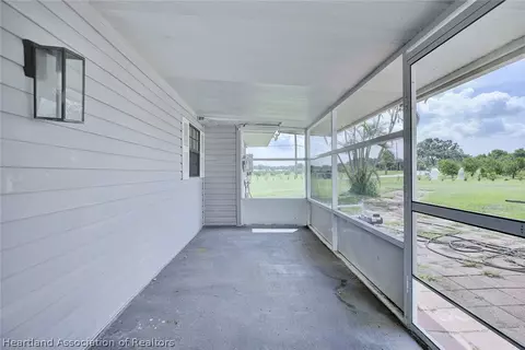 Exterior - 1216 Edgewater Point Dr, Sebring, FL 33870 photo 4 of 9