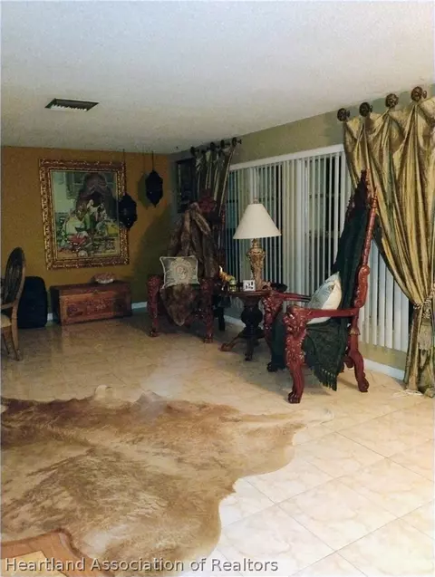 Living - 7317 Lime Tree Ct, Sebring, FL 33876 photo 1 of 2