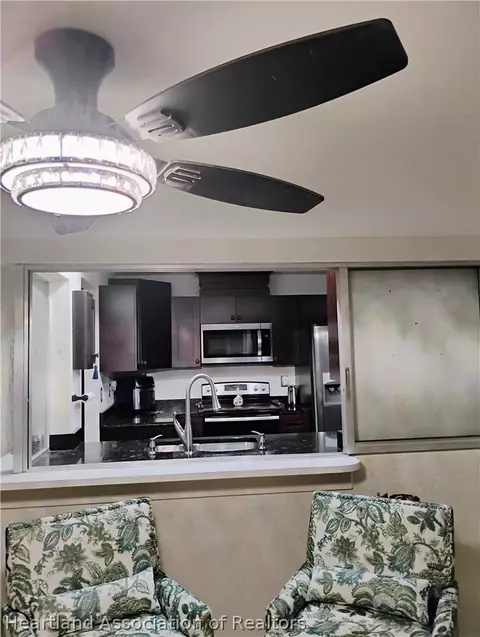 Kitchen - 7317 Lime Tree Ct, Sebring, FL 33876 photo 2 of 2