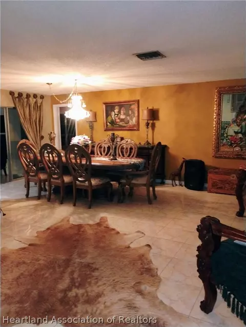 Dining - 7317 Lime Tree Ct, Sebring, FL 33876 photo 1 of 4
