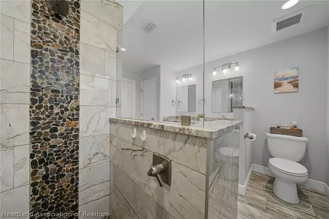 Bath - 717 Cypress Ct, Sebring, FL 33876 photo 3 of 5