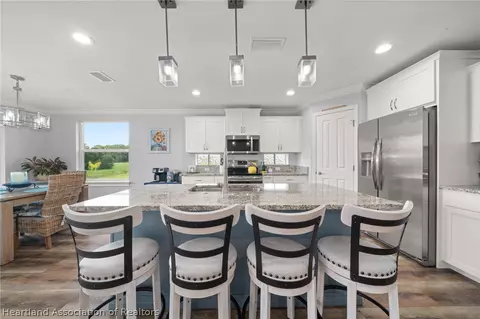 Kitchen - 717 Cypress Ct, Sebring, FL 33876 photo 1 of 5