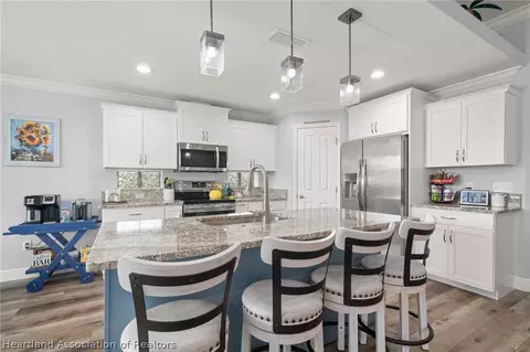 Kitchen - 717 Cypress Ct, Sebring, FL 33876 photo 2 of 5