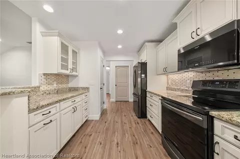 Kitchen - 5130 Pebble Beach Dr, Sebring, FL 33872 photo 4 of 4