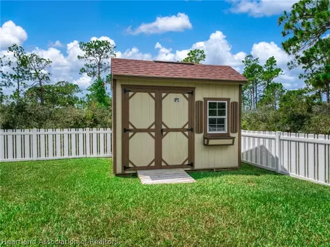 Exterior - 5130 Pebble Beach Dr, Sebring, FL 33872 photo 4 of 6
