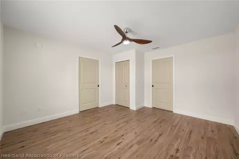 Bedroom - 5130 Pebble Beach Dr, Sebring, FL 33872 photo 4 of 6
