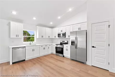 Kitchen - 6898 Dickinson Dr, Sebring, FL 33872 photo 1 of 3