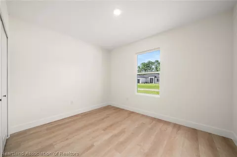 Bedroom - 8725 Capilla St, Sebring, FL 33872 photo 10 of 11