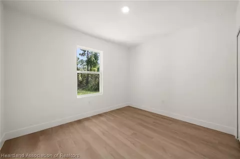 Bedroom - 8725 Capilla St, Sebring, FL 33872 photo 8 of 11