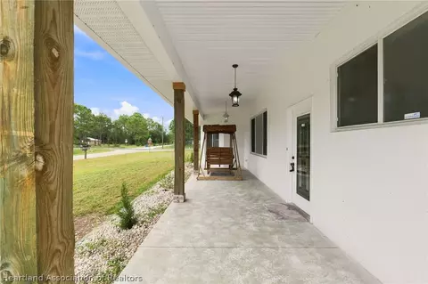 Exterior - 837 Lily St, Sebring, FL 33875 photo 3 of 5