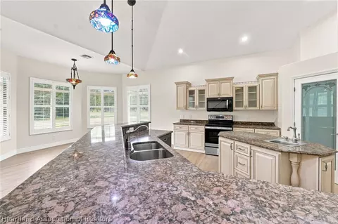 Kitchen - 837 Lily St, Sebring, FL 33875 photo 3 of 4
