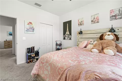 Bedroom - 5124 Moss Hammock Trl, Sebring, FL 33872 photo 9 of 9
